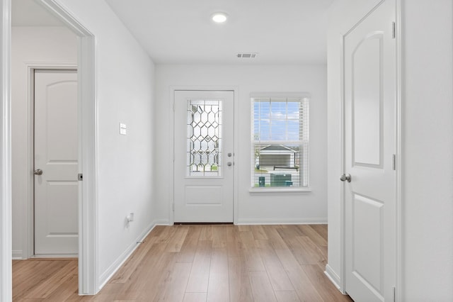 foyer with light hardwood / wood-style floors