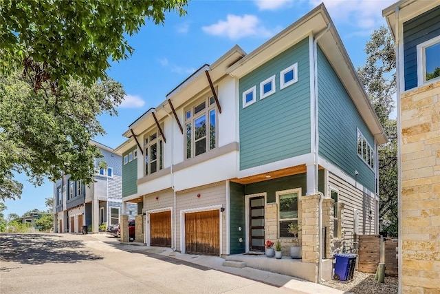 view of front of property featuring a garage