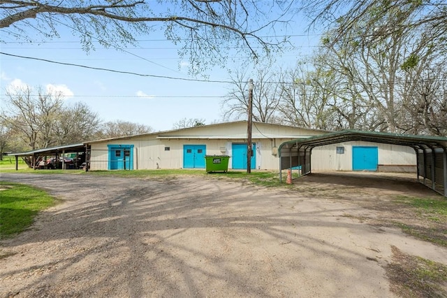 single story home with a carport