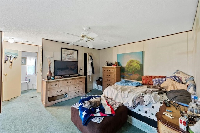 bedroom with light carpet, a textured ceiling, and ceiling fan