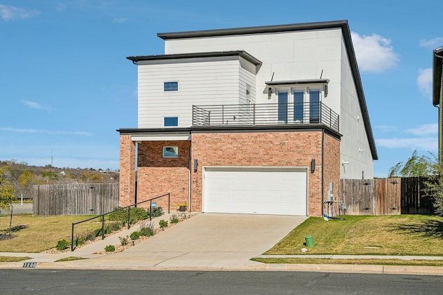 contemporary home featuring a garage, a balcony, and a front lawn