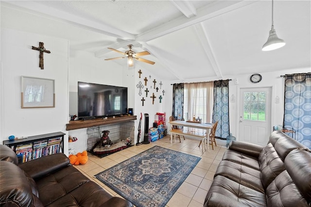 living room featuring ceiling fan, light tile patterned floors, and lofted ceiling with beams