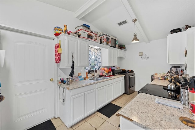 kitchen featuring pendant lighting, stainless steel electric range, sink, light tile patterned floors, and white cabinetry