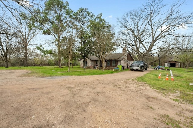 view of front of property with a front lawn