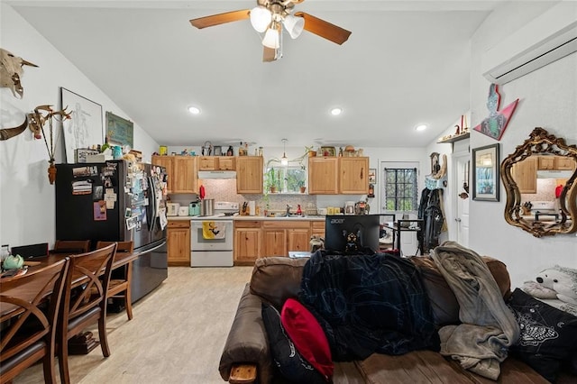 kitchen with white electric range oven, stainless steel fridge, decorative backsplash, and lofted ceiling