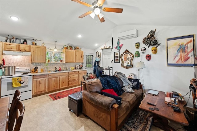 living room with ceiling fan, lofted ceiling, sink, and a wall mounted AC