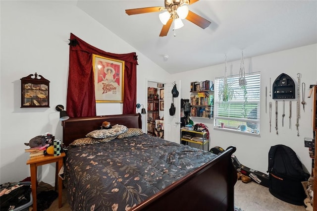 carpeted bedroom with ceiling fan and lofted ceiling