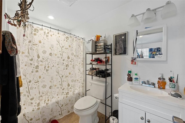 full bathroom featuring vanity, toilet, and shower / bathtub combination with curtain