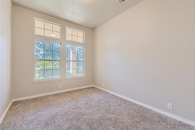 empty room with carpet flooring