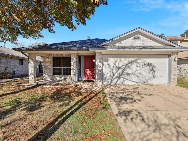 single story home with a garage and a front yard