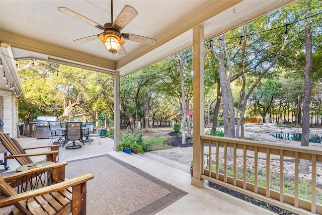 view of patio / terrace with ceiling fan and a grill