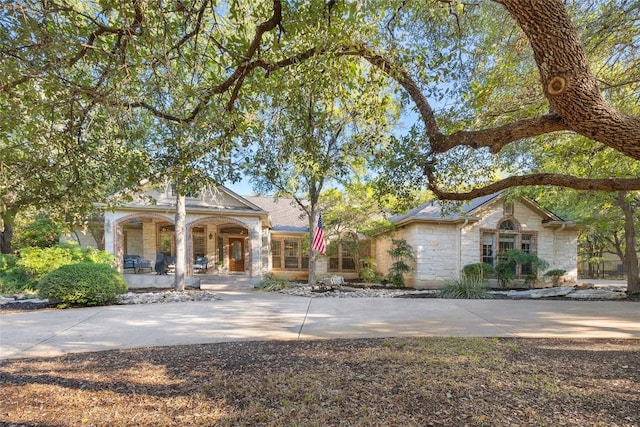 204 Woodland Park, Georgetown, TX 78633 - view of front of house with a porch and stone siding