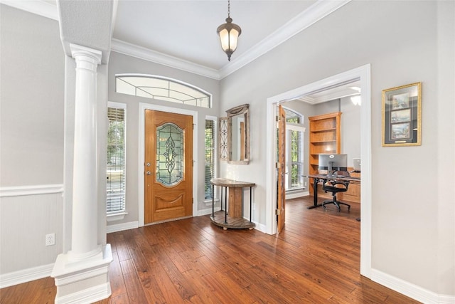 204 Woodland Park, Georgetown, TX 78633 - foyer entrance with decorative columns, hardwood / wood-style flooring, and ornamental molding