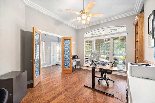 office space with lofted ceiling, french doors, ceiling fan, ornamental molding, and wood-type flooring