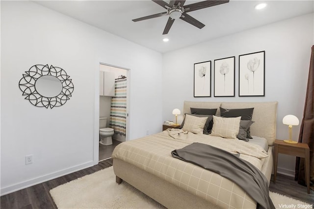 bedroom with recessed lighting, dark wood-type flooring, a ceiling fan, connected bathroom, and baseboards