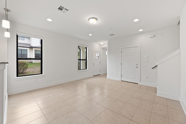 view of tiled spare room