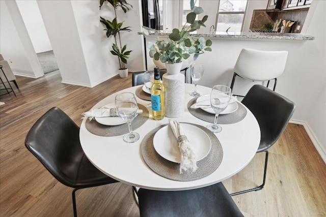 dining area featuring light hardwood / wood-style flooring