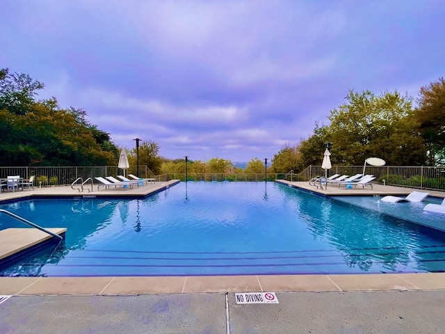 view of pool featuring a patio area