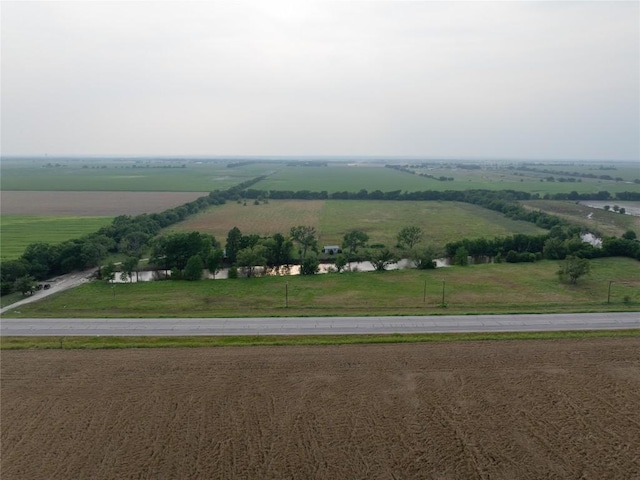 birds eye view of property with a rural view