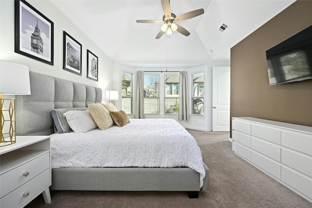 bedroom with visible vents, a ceiling fan, carpet flooring, vaulted ceiling, and baseboards