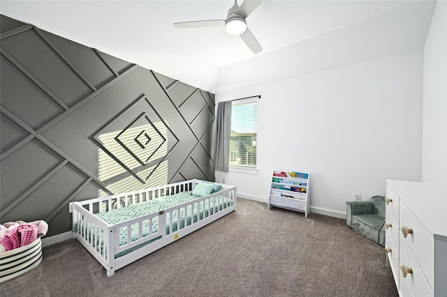 bedroom featuring vaulted ceiling, carpet, a ceiling fan, and baseboards