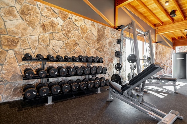 workout area with wooden ceiling