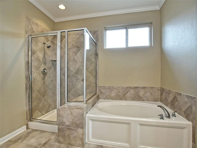 5021 Pyrenees Pass, Austin, TX 78738 - bathroom with a bath, a shower stall, ornamental molding, and tile patterned flooring