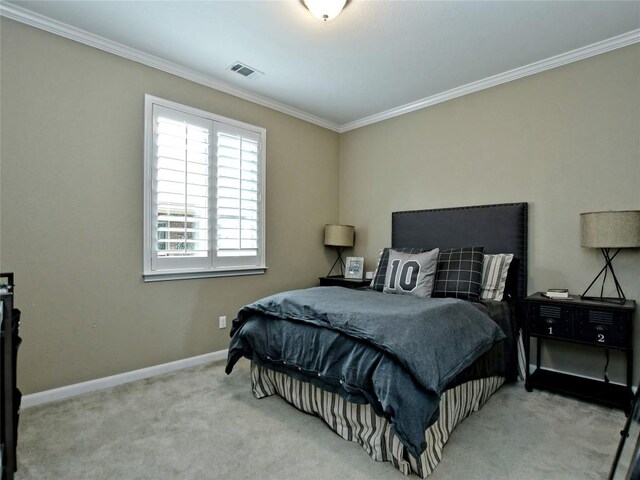 carpeted bedroom with crown molding