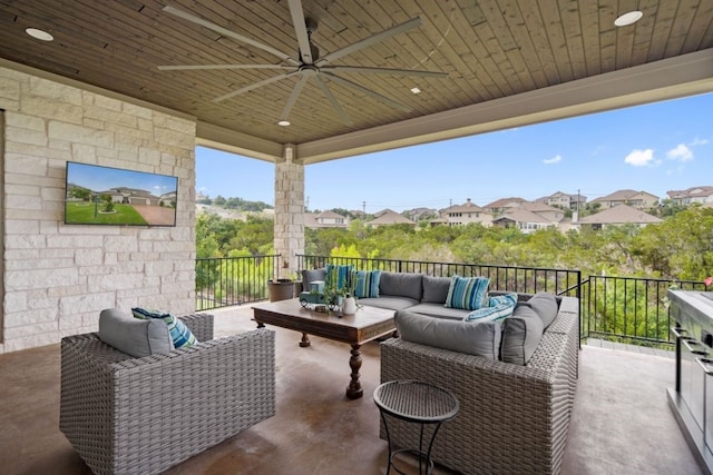 view of patio featuring an outdoor living space and ceiling fan