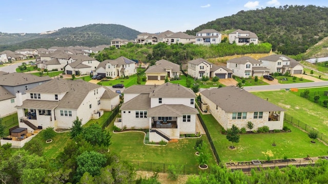 drone / aerial view featuring a mountain view