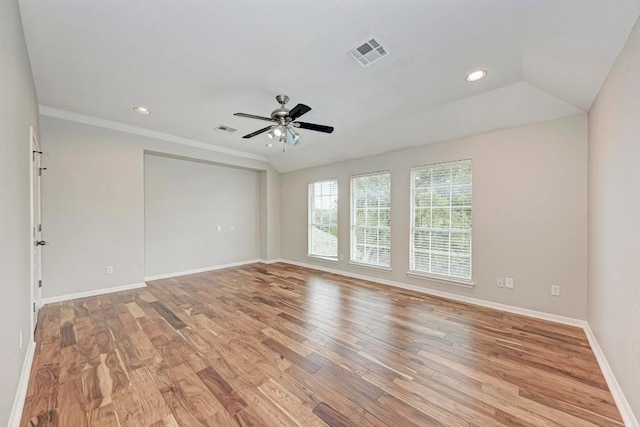 unfurnished room with ceiling fan and light wood-type flooring