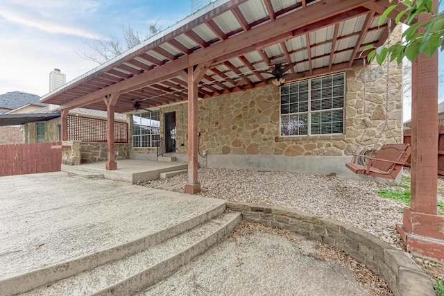 view of patio / terrace featuring ceiling fan