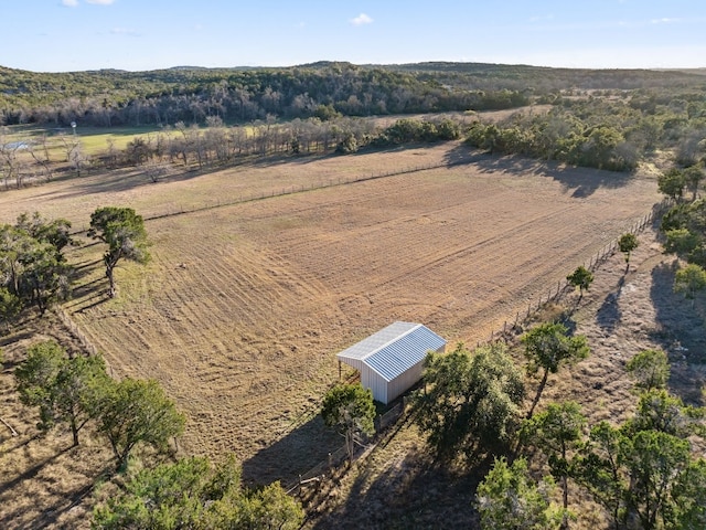 birds eye view of property featuring a rural view