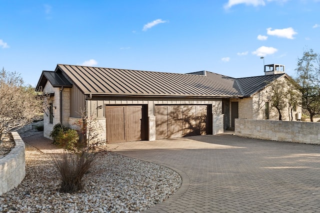 view of front of home with a garage