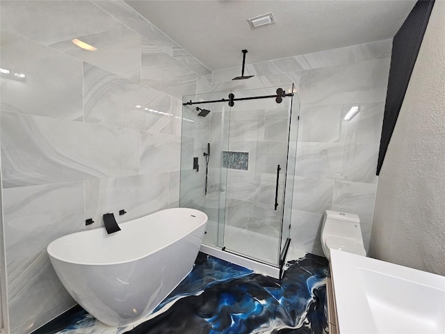 bathroom with separate shower and tub and toilet