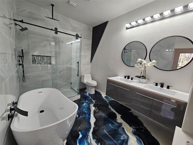 11806 Prairie Hen Ln, Austin, TX 78758 - full bath with double vanity, a stall shower, a freestanding tub, and a textured wall