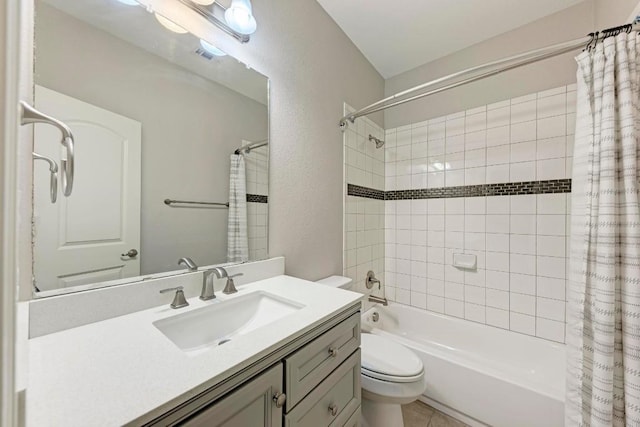 full bathroom with vanity, toilet, and shower / tub combo with curtain