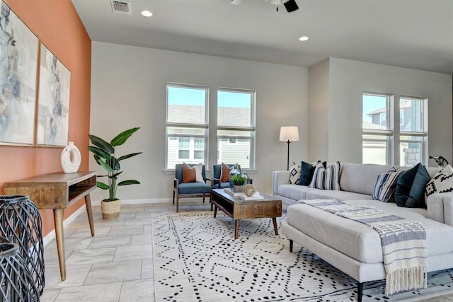 living room featuring ceiling fan