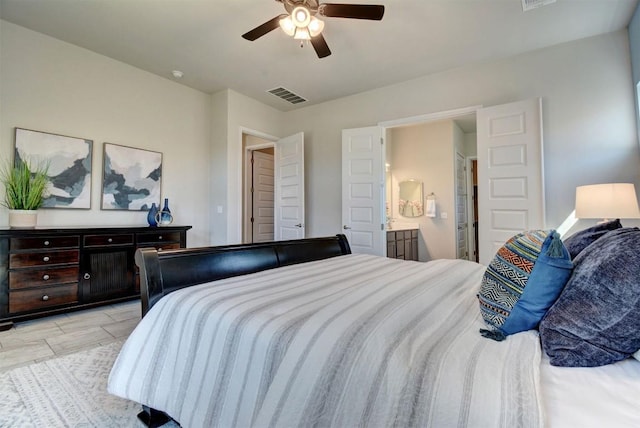 bedroom featuring ceiling fan and connected bathroom