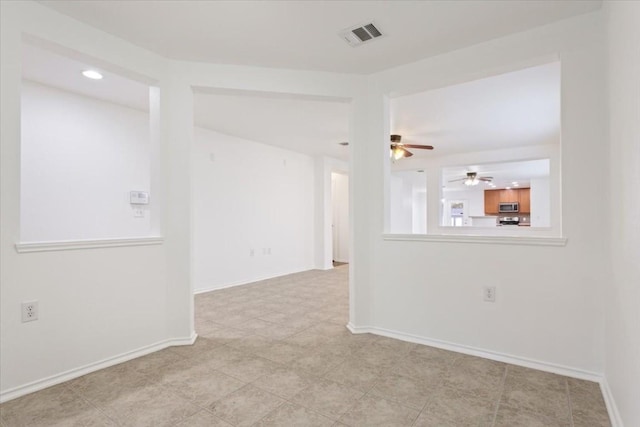 spare room featuring ceiling fan