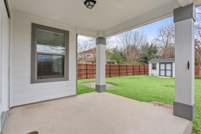 view of patio / terrace featuring a shed