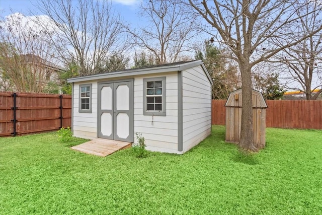 view of outdoor structure featuring a yard