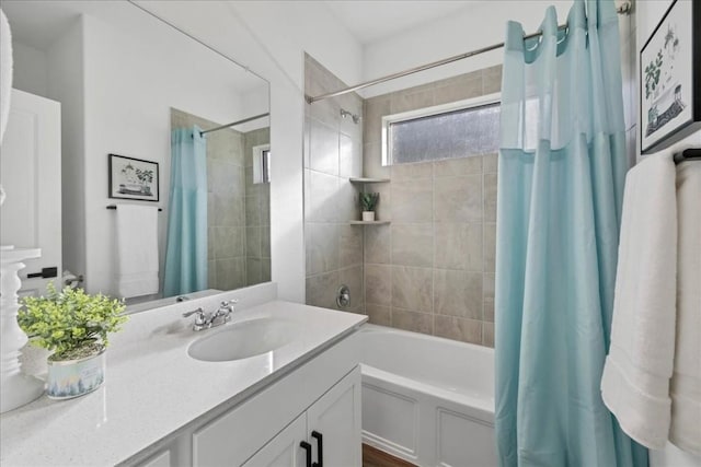 bathroom with vanity and shower / tub combo