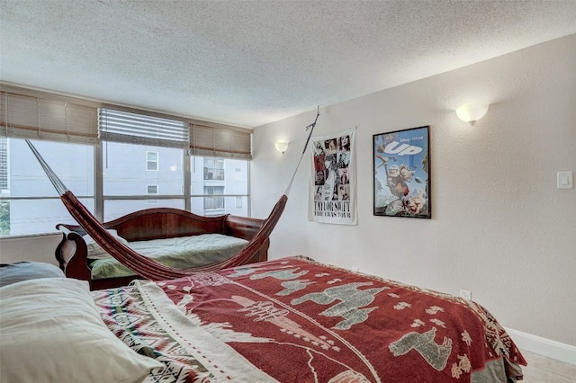 bedroom featuring a textured ceiling