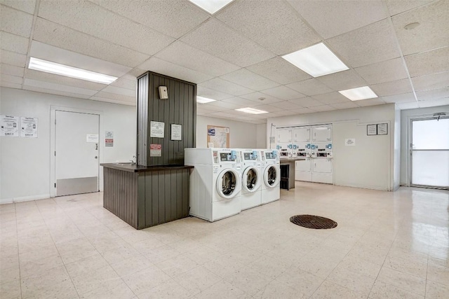 laundry area with washing machine and clothes dryer