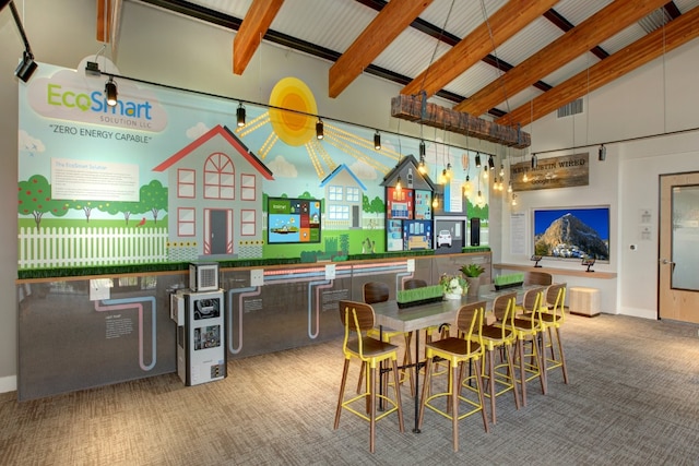 playroom featuring beam ceiling, high vaulted ceiling, and light colored carpet