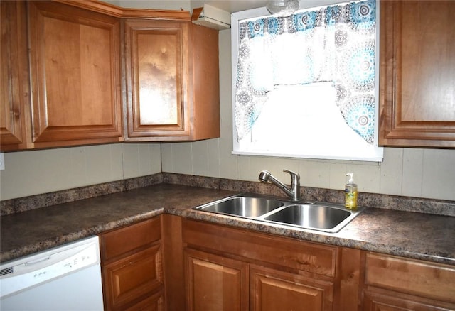 kitchen featuring dishwasher, a healthy amount of sunlight, and sink