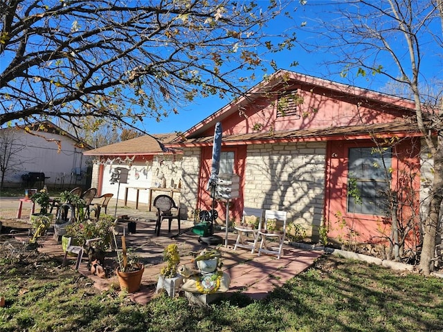 back of house featuring a patio area