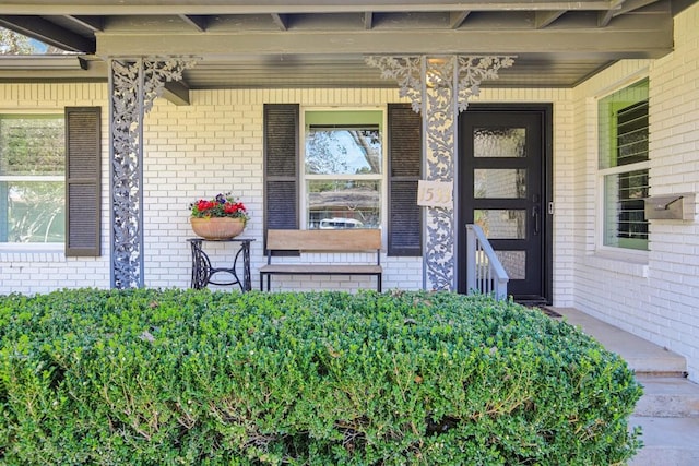 property entrance featuring covered porch