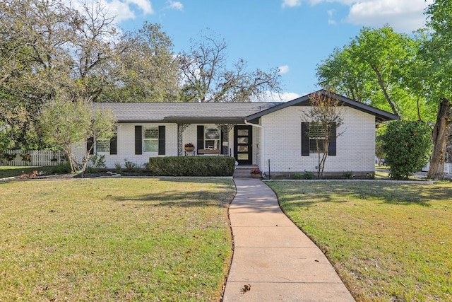 ranch-style house with a front yard